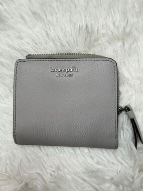kate spade New York light gray Saffiano zip wallet
